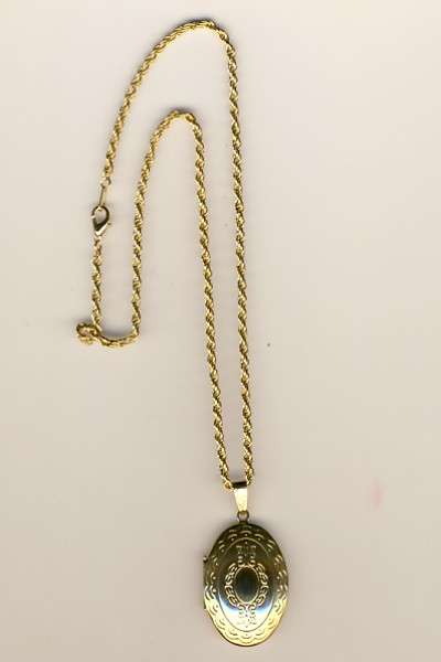 Photo pendant on gold colour chain
