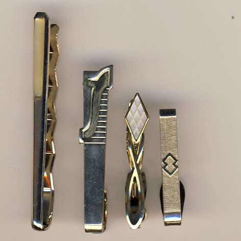 Lot of 4 tie pins - as per scan - you bid per pair to take all