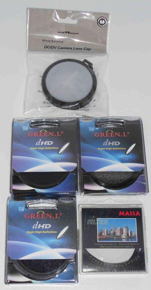 4x 58mm lens filters + white balance cap