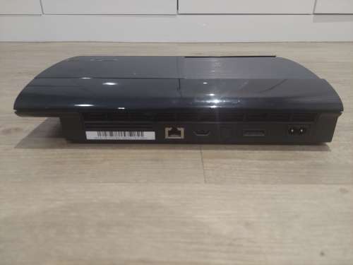 Sony PlayStation 3 Super Slim + 4 Games + 2 Controllers