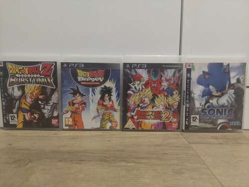 Sony PlayStation 3 Super Slim + 4 Games + 2 Controllers