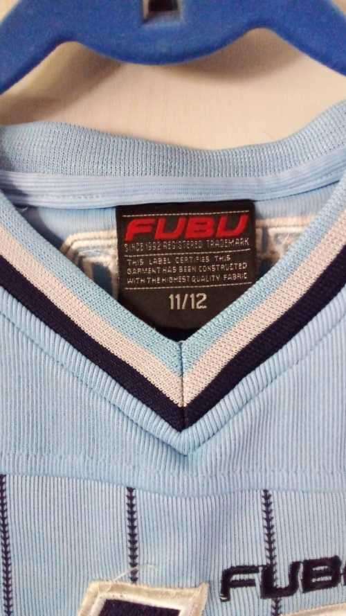 Authentic Vintage Fubu Blue nr 05 Basketball Jersey.