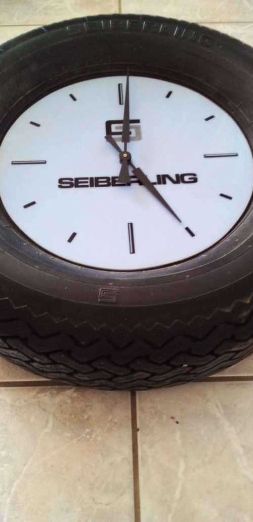 Seiberling Working Tyre Man Cave Wall Clock in a Seiberling Tyre