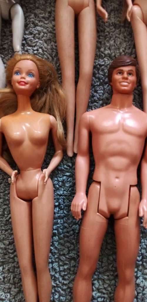 A Collection of 15 Dolls Including a 1966 and 1968 Mattel Ken and Barbie