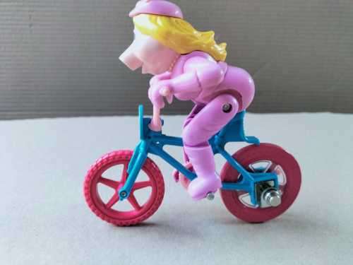 Miss Piggy Articulated Toy on Bike
