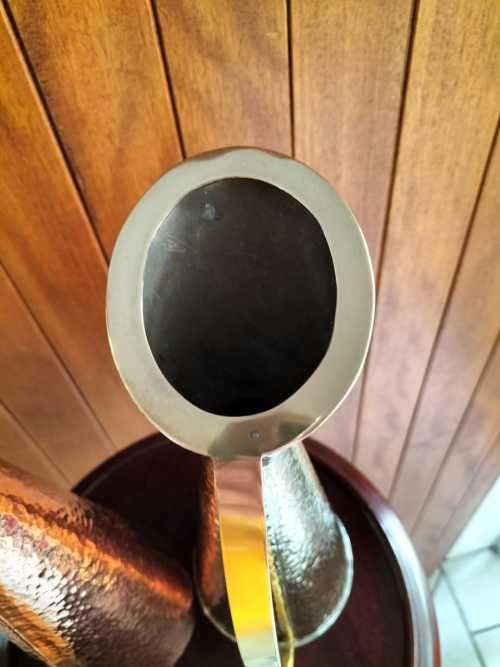 An Absolutely Magnificent Pair of Hammered Brass/CopperJugs