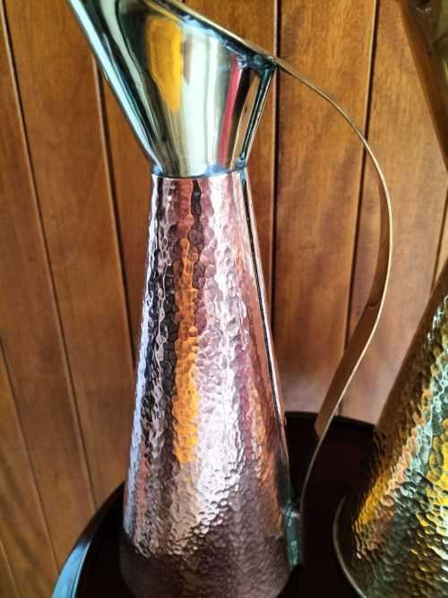 An Absolutely Magnificent Pair of Hammered Brass/CopperJugs
