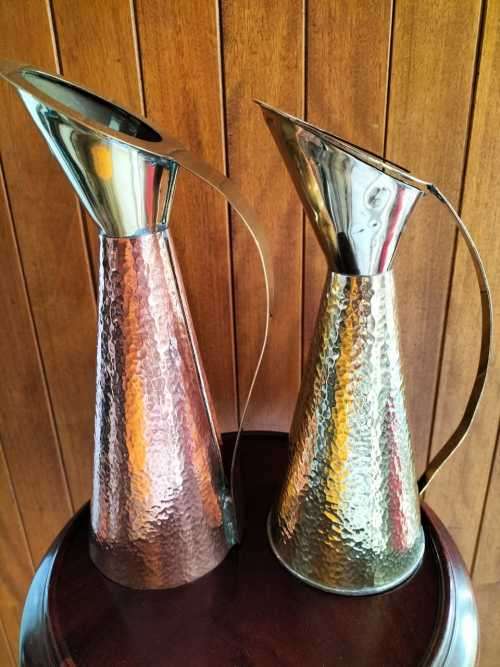 An Absolutely Magnificent Pair of Hammered Brass/CopperJugs