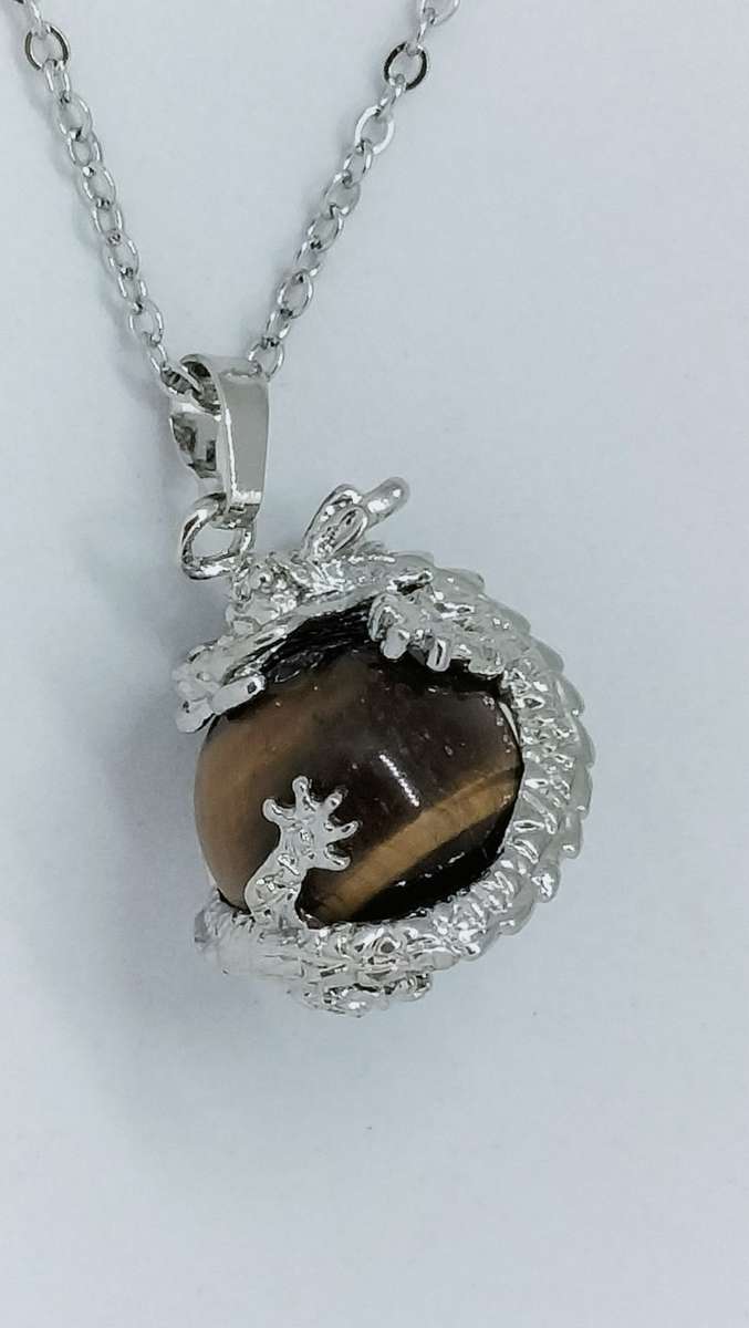 Stunning Tiger`s Eye Stone Pendant With Stainless Steel Casing Of A Dragon
