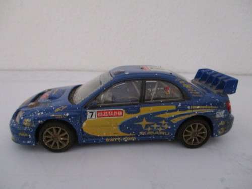 1/32 SCALE SCX SLOT CAR SUBARU IMPREZA WRC (SPAIRS OR REPAIRS)