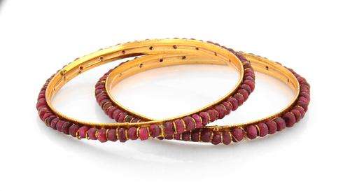 A Pair of  Ruby Gemstone Bangles