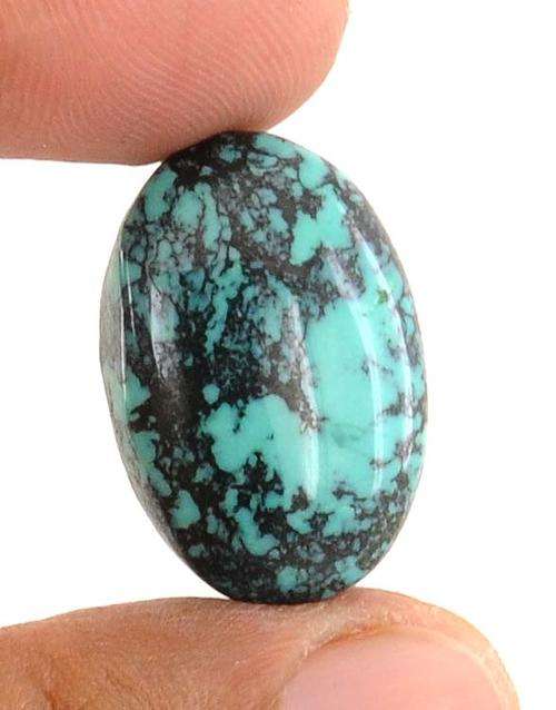 31.26 Ct Certified Oval Unmounted Turquoise Gemstone with Black Matrix