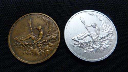 medalloins; World waveski team titles 1993 and 2nd place Border Closed paddle ski comp.1993