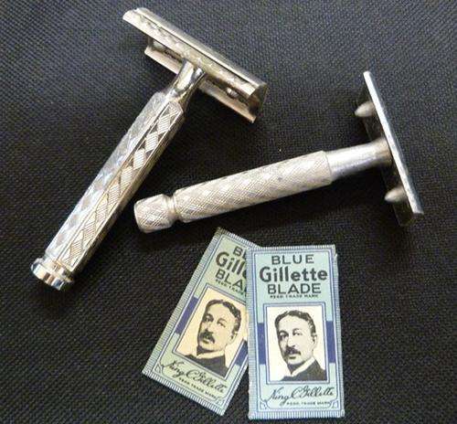 Two vintage razors with two Gillette blades in original wrapping