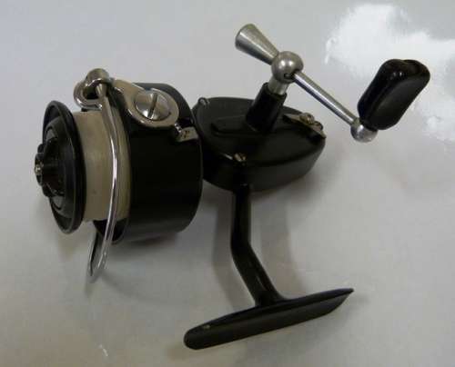 vintage Mitchell 304 spinning reel with spare spool in original container