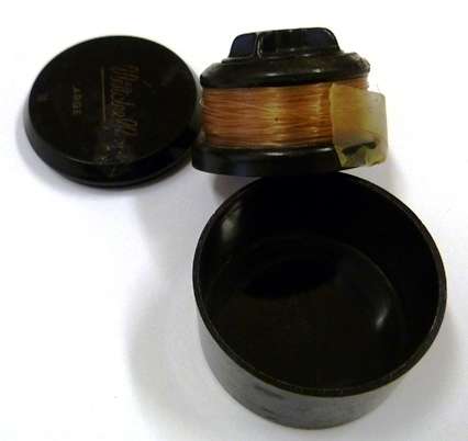 Spare spool in container for Mitchell spinning reel