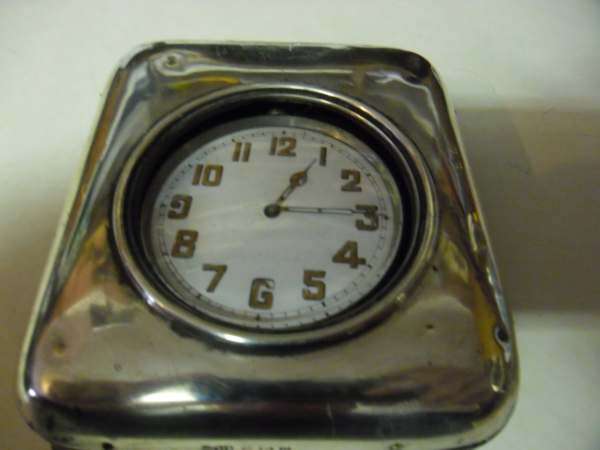 POCKET TRAVEL CLOCK IN HALLMARKED SILVER CASE