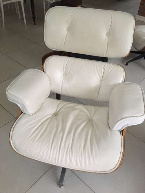 Eames Type Leather Chairs: pair of genuine leather chairs with ottomans
