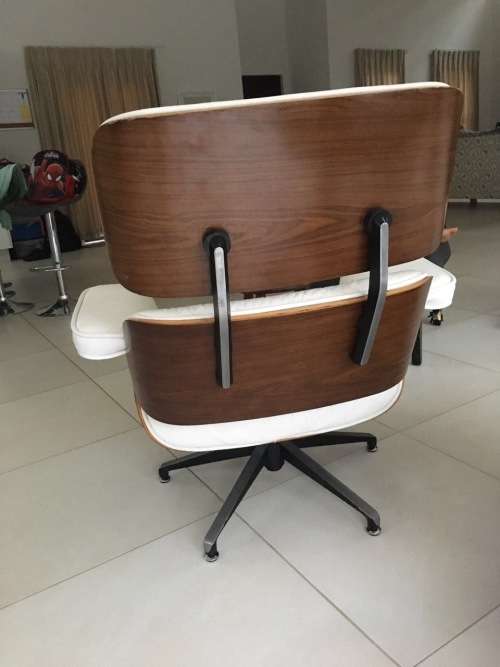 Eames Type Leather Chairs: pair of genuine leather chairs with ottomans