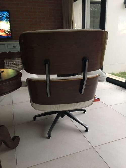 Eames Type Leather Chairs: pair of genuine leather chairs with ottomans