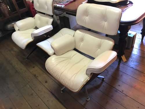 Eames Type Leather Chairs: pair of genuine leather chairs with ottomans
