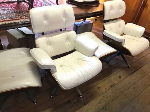 Eames Type Leather Chairs: pair of genuine leather chairs with ottomans
