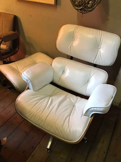 Eames Type Leather Chairs: pair of genuine leather chairs with ottomans