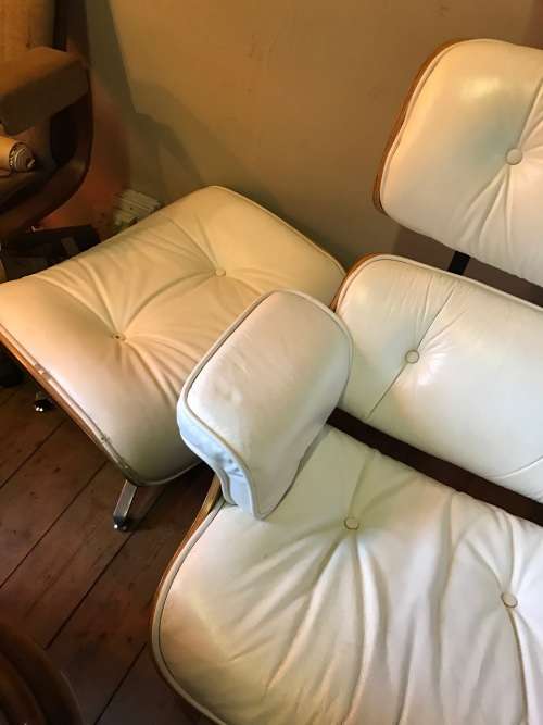Eames Type Leather Chairs: pair of genuine leather chairs with ottomans