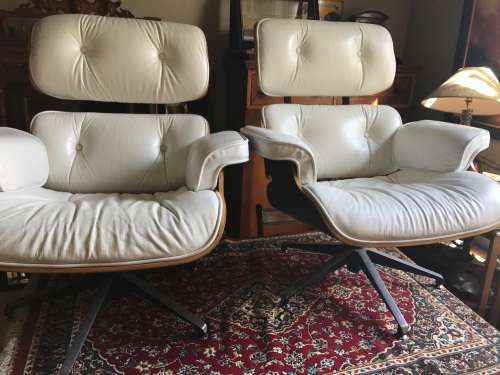 Eames Type Leather Chairs: pair of genuine leather chairs with ottomans