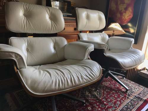 Eames Type Leather Chairs: pair of genuine leather chairs with ottomans