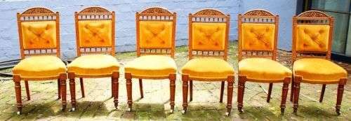 Edwardian Oak Chairs on castors in good condition: Set of 6 ( Bid for the set )
