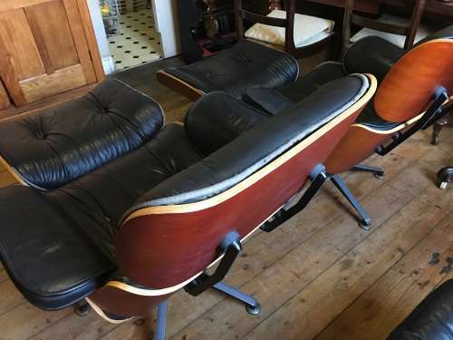 Eames Type Chairs: pair of leather chairs with ottomans