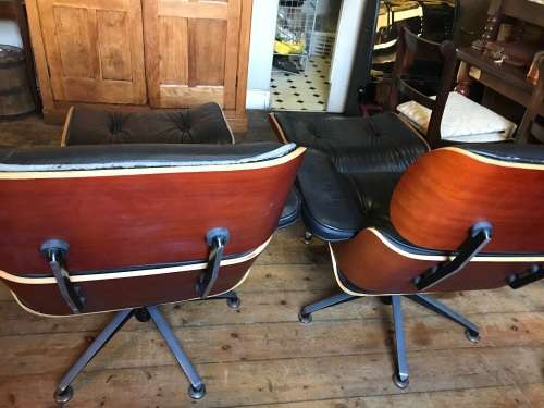 Eames Type Chairs: pair of leather chairs with ottomans