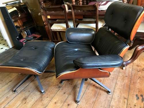 Eames Type Chairs: pair of leather chairs with ottomans