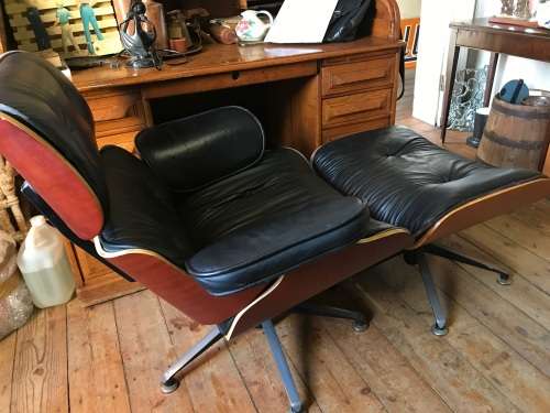 Eames Type Chairs: pair of leather chairs with ottomans