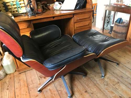 Eames Type Chairs: pair of leather chairs with ottomans