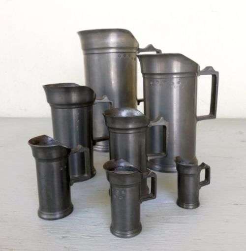 Set of  7 Victorian Pewter/Tin Measure Jugs ( set of 7, from 20 cm to 4 cm )