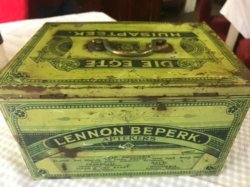 Lennon se Egte Huis Apteek with some medicine in the original packing