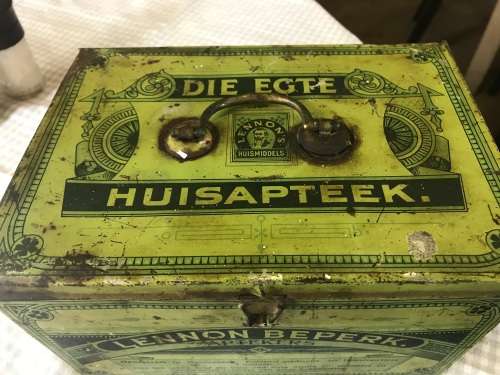 Lennon se Egte Huis Apteek with some medicine in the original packing