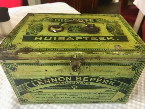 Lennon se Egte Huis Apteek with some medicine in the original packing