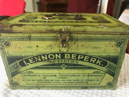 Lennon se Egte Huis Apteek with some medicine in the original packing