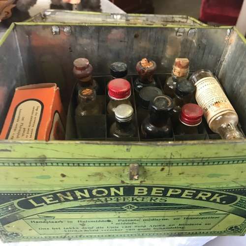 Lennon se Egte Huis Apteek with some medicine in the original packing