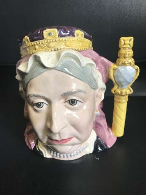 4 ROYAL DOULTON JUGS ( QUEEN VICTORIA , THE INDIAN , SANTA CLAUS , THE LEPRECHAUN )