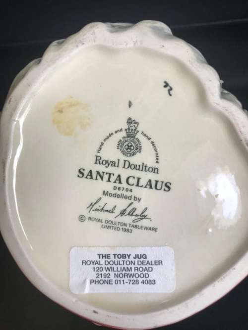 4 ROYAL DOULTON JUGS ( QUEEN VICTORIA , THE INDIAN , SANTA CLAUS , THE LEPRECHAUN )