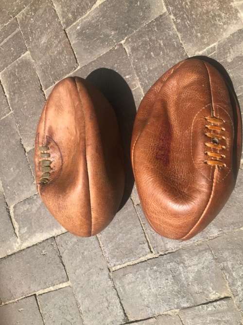 Rugby Balls: Three vintage leather rugby balls