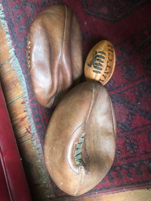 Rugby Balls: Three vintage leather rugby balls