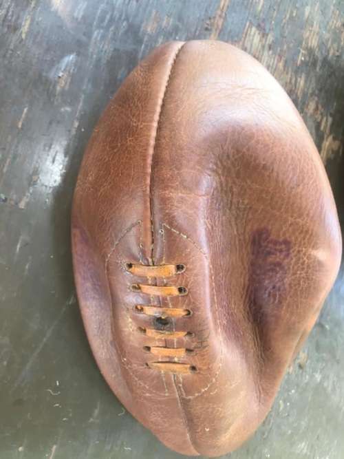 Rugby Balls: Three vintage leather rugby balls