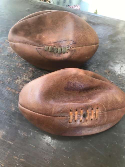 Rugby Balls: Three vintage leather rugby balls