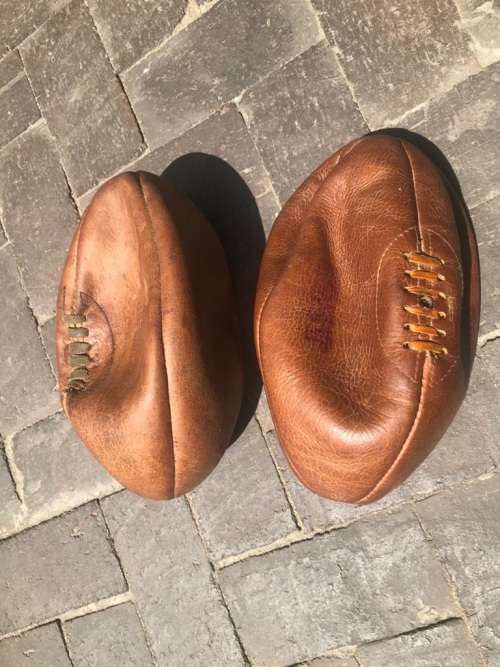 Rugby Balls: Three vintage leather rugby balls