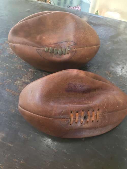 Rugby Balls: Three vintage leather rugby balls